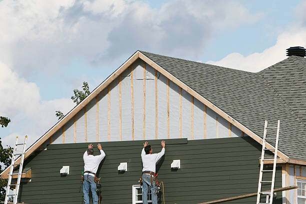 Professional Siding Replacement technician working in Glenwood Landing, NY